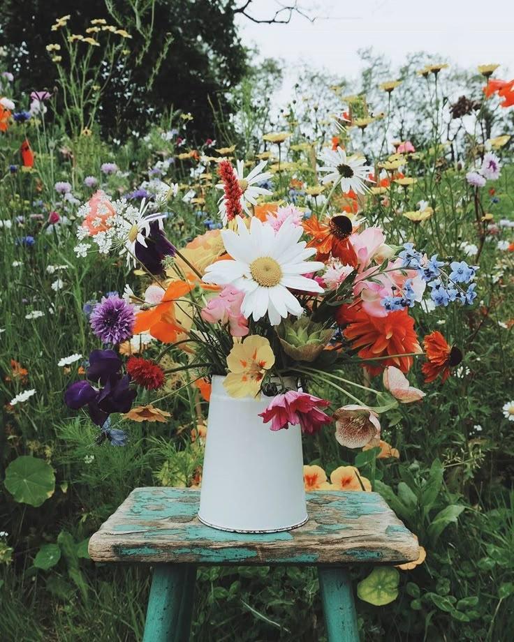 Corporate meeting room with carefully timed floral arrangements that maintain elegance throughout business hours